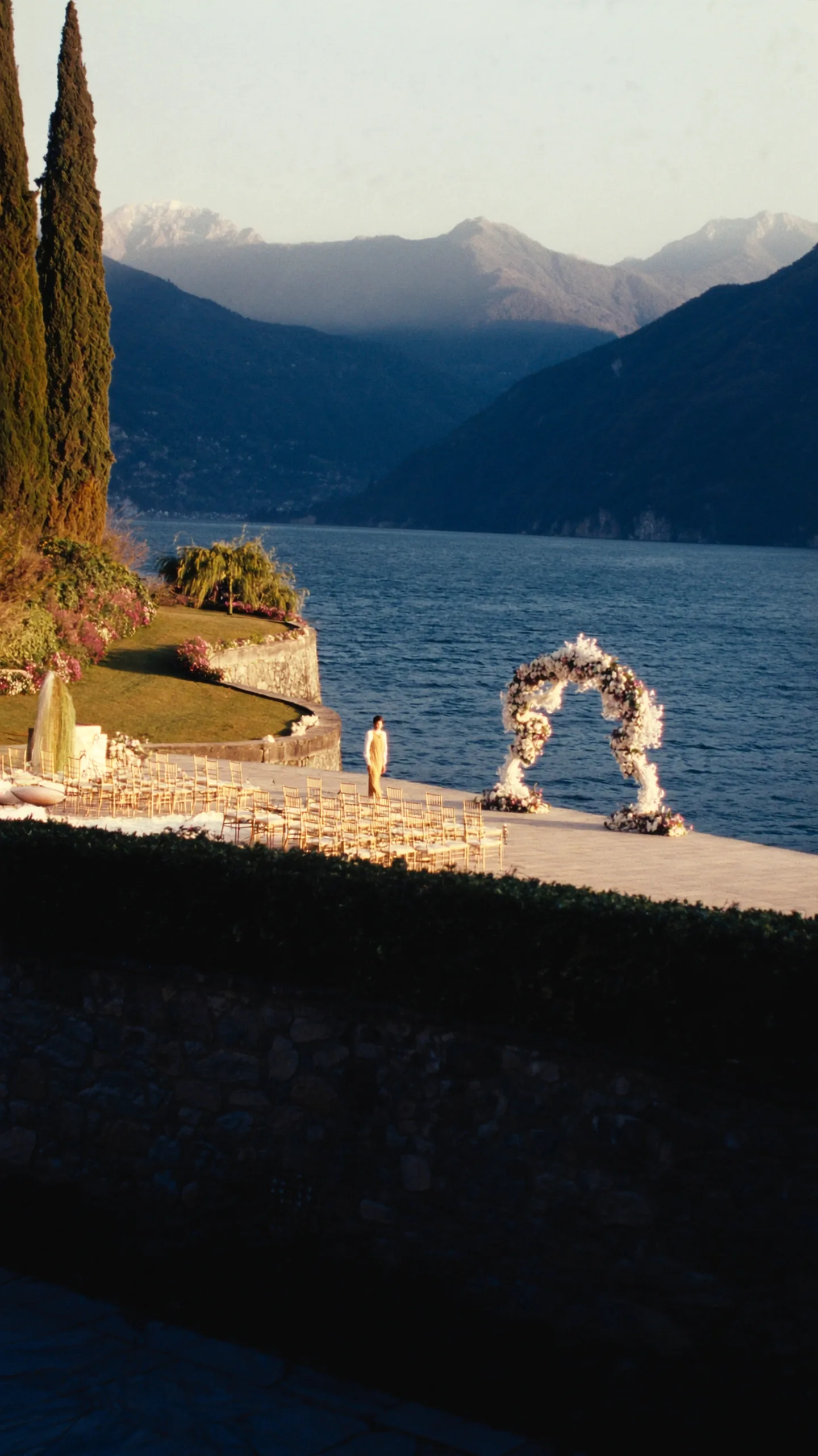 A lakeside ceremony on Lake Como at golden hour